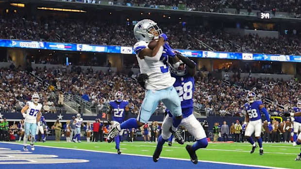 Brandin Cooks (3) scores one of Dallas' seven touchdowns on Sunday afternoon